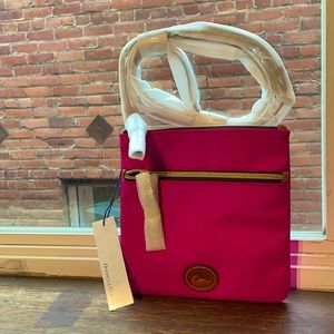 Fuchsia Dooney and Bourke crossbody purse